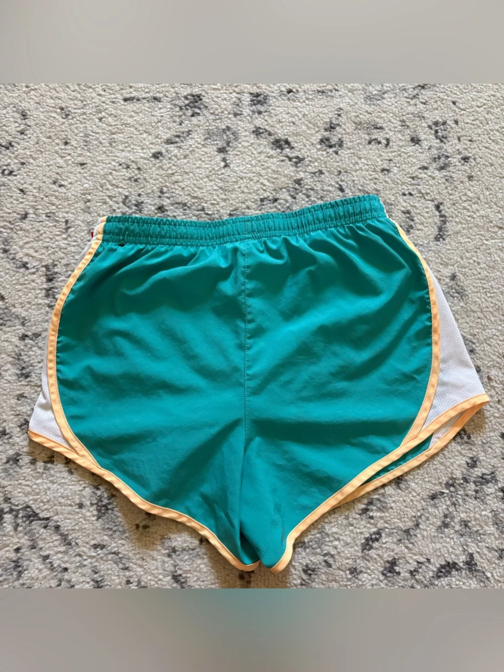 Nike Girls size M Teal Athletic Shorts with Orange Trim